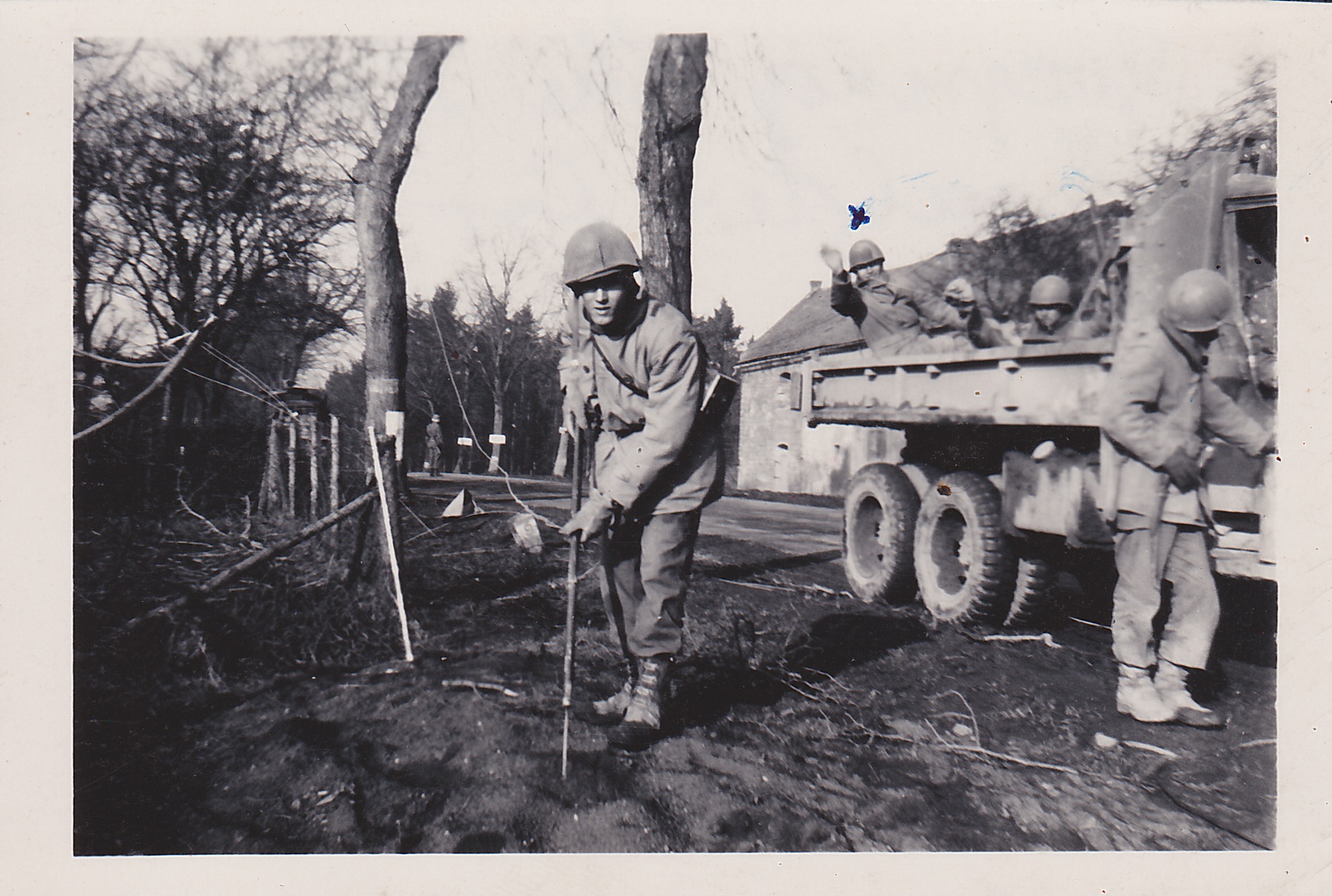 Sweeping shoulder of road for mines - 1945